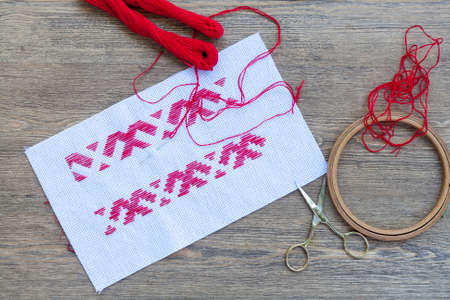 Ukrainian national red embroidery thread, selective focusの写真素材