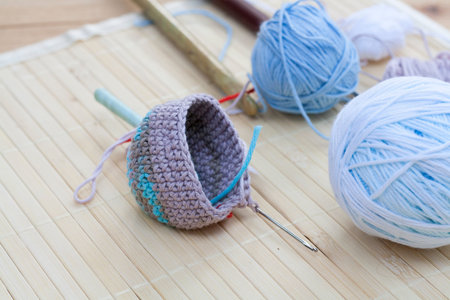 Color woolen clews for knitting and crochet woven piece close-up, selective focusの写真素材