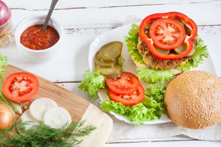 Homemade hamburger on white plateの写真素材