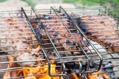 Grilled pork steaks on the grillの写真素材