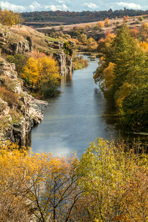 Terrific view of the River Canyon on a sunny fall dayTerrific view of the River Canyon on a cloudy fall day. Buky Canyon on the Hirs'kyi Tikych river in Ukraineの写真素材