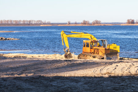 Excavator or digger and excavators working on ground. Industrial machinery at working construction...