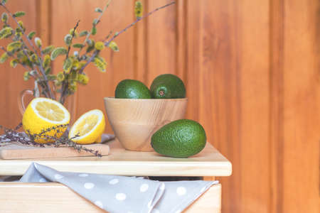 Healthy delicious nutritious breakfast. Rye bread with avocado and lemon, on the kitchen table.の写真素材