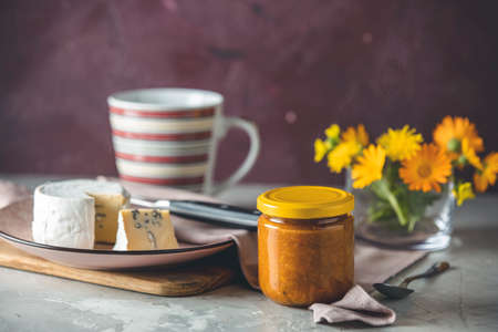 Chutney apricot with blue cheese on pink plate. Tasty food close up viewの写真素材