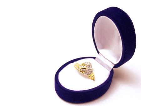 A box with a gold ring isolated on white background, photographyの写真素材