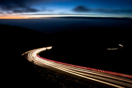 Night road against the sunset sky 