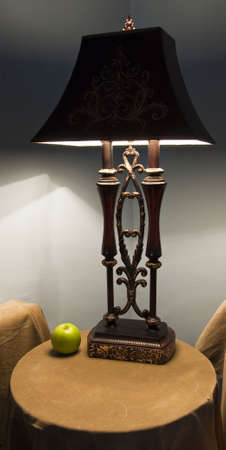 The ancient lamp and green apple の写真素材