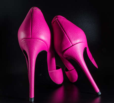 Pink shoes on a black background closeup 2018の写真素材