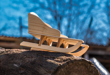 Decorative sleigh against a background of snow closeup