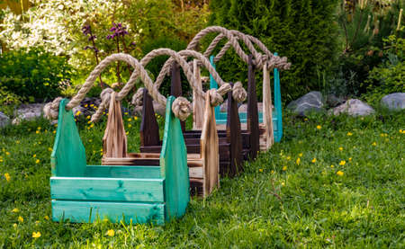 Homemade drawers with rope handles against the backdrop of nature 2018の写真素材