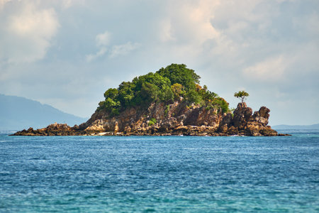 Small stone island with trees in Thailand 2018