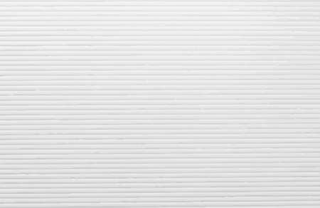 Striped embossed paper texture. Vector abstract white background with horizontal linesのイラスト素材