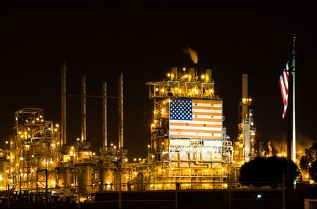 Picture of a lighted up factory at the nightの写真素材