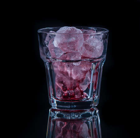 cranberry juice with ice cubesの写真素材