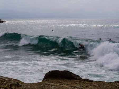 Surfing a wave on 10 of October in Costa da Caparica, Portugal.のeditorial素材