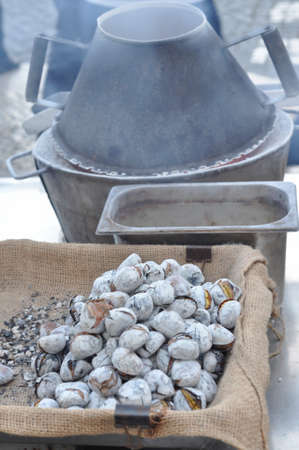 Hot Roasted chestnuts in the streets of Lisbon, Portugal in mids October 2018.の写真素材