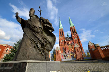 Statue of John Paul II against the background of the cathedral (Rybnik, Poland)のeditorial素材