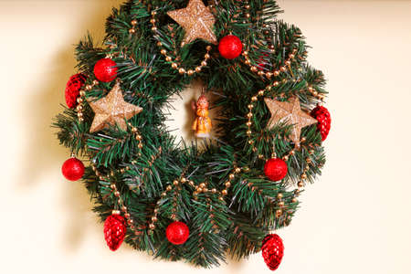 Christmas wreath on the wall and baublesの写真素材