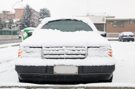 Parked car under the snow