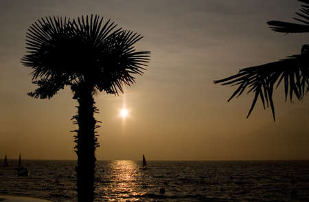 Sunset on Garda lake (Italy)の写真素材