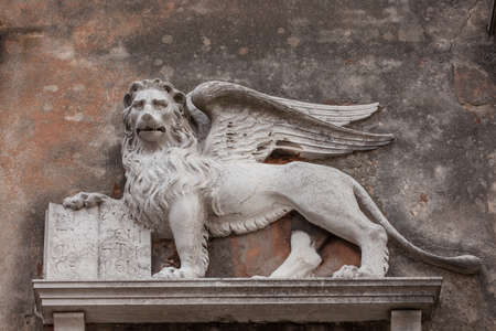 Sculpture of a winged lion, symbol of Veniceの写真素材