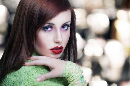 Portrait of a beauty brunette with red lipsの写真素材