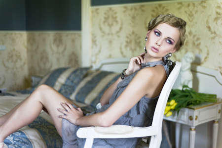 Sexy woman in the stylish roomの写真素材