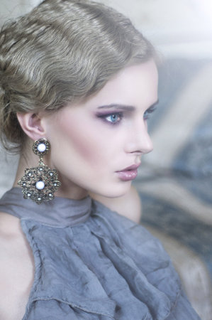 Portrait of a beauty woman in stylish room