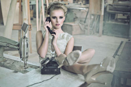 Sensual woman with a phoneの写真素材