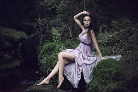 Sensual woman in nature sceneryの写真素材