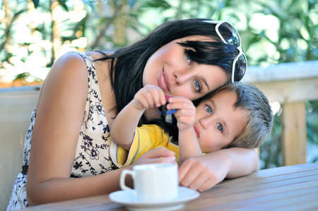 Mother hugging sonの写真素材