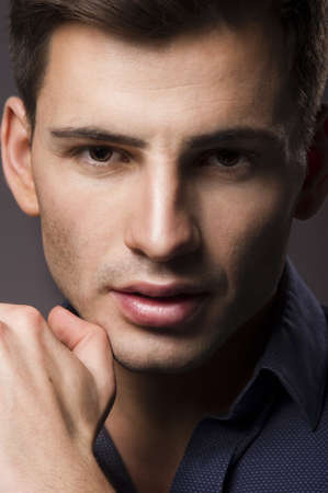 Portrait of a happy young businessman in shirtの写真素材