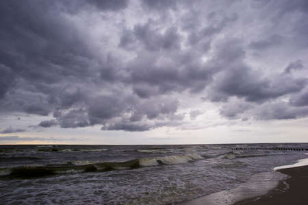 Stormy sea and heavy cloudsの写真素材