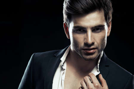 Portrait of handsome stylish man in elegant suitの写真素材