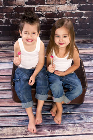 Two happy kids in studioの写真素材