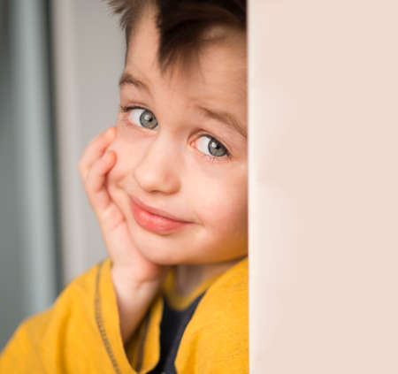 Smiling young blond boyの写真素材