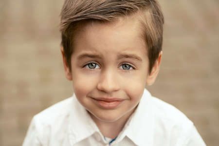 Beauty portrait of small happy boyの写真素材