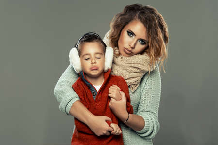 Portrait of a young woman with her sonの写真素材