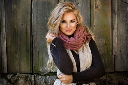 Young girl smiling in autumn sceneryの写真素材