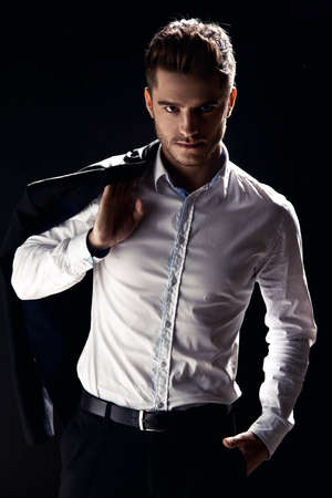 Elegant young handsome man. Studio fashion portrait.の写真素材