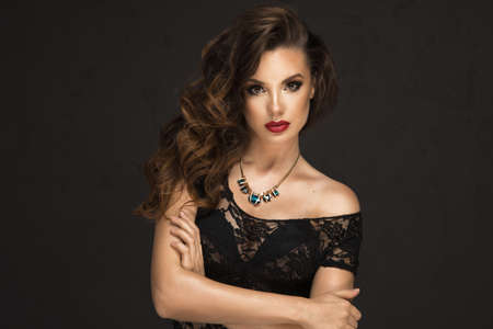 Sexy brunette woman with red lipsの写真素材