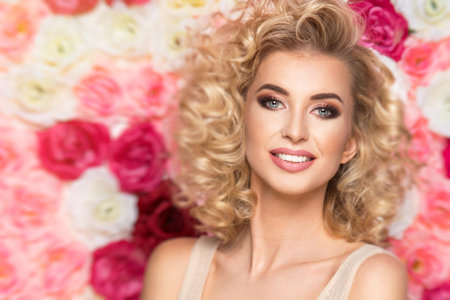 Beauty happy model girl with flowers
