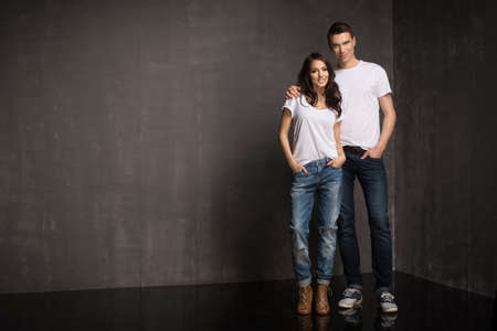 Happy casual couple in jeansの写真素材