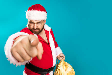 Bad Santa Claus pointing on you, concept christmasの写真素材