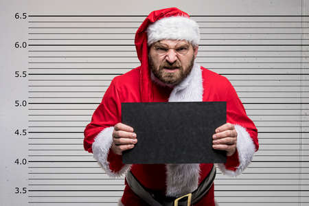 Bad Santa Claus pointing on you, concept christmasの写真素材
