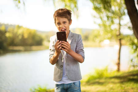 Happy child make photoの写真素材