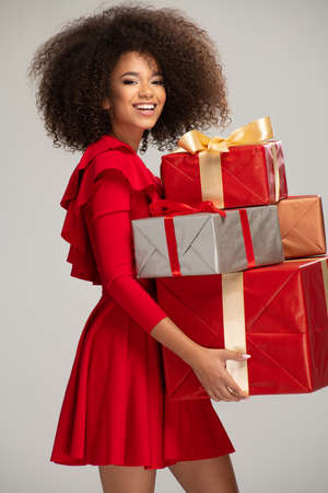 Female model wear red dress keeps giftsの写真素材