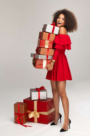 Female model wear red dress keeps giftsの写真素材