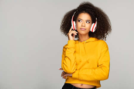 Young woman enjoying musicの写真素材
