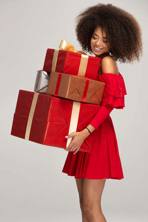 Female model wear red dress keeps giftsの写真素材
